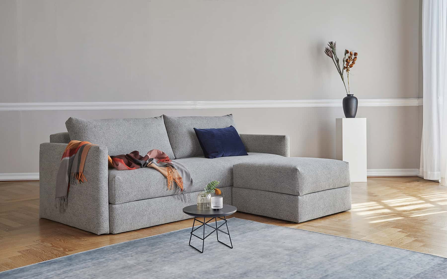 Cornila ottoman in a living room setting