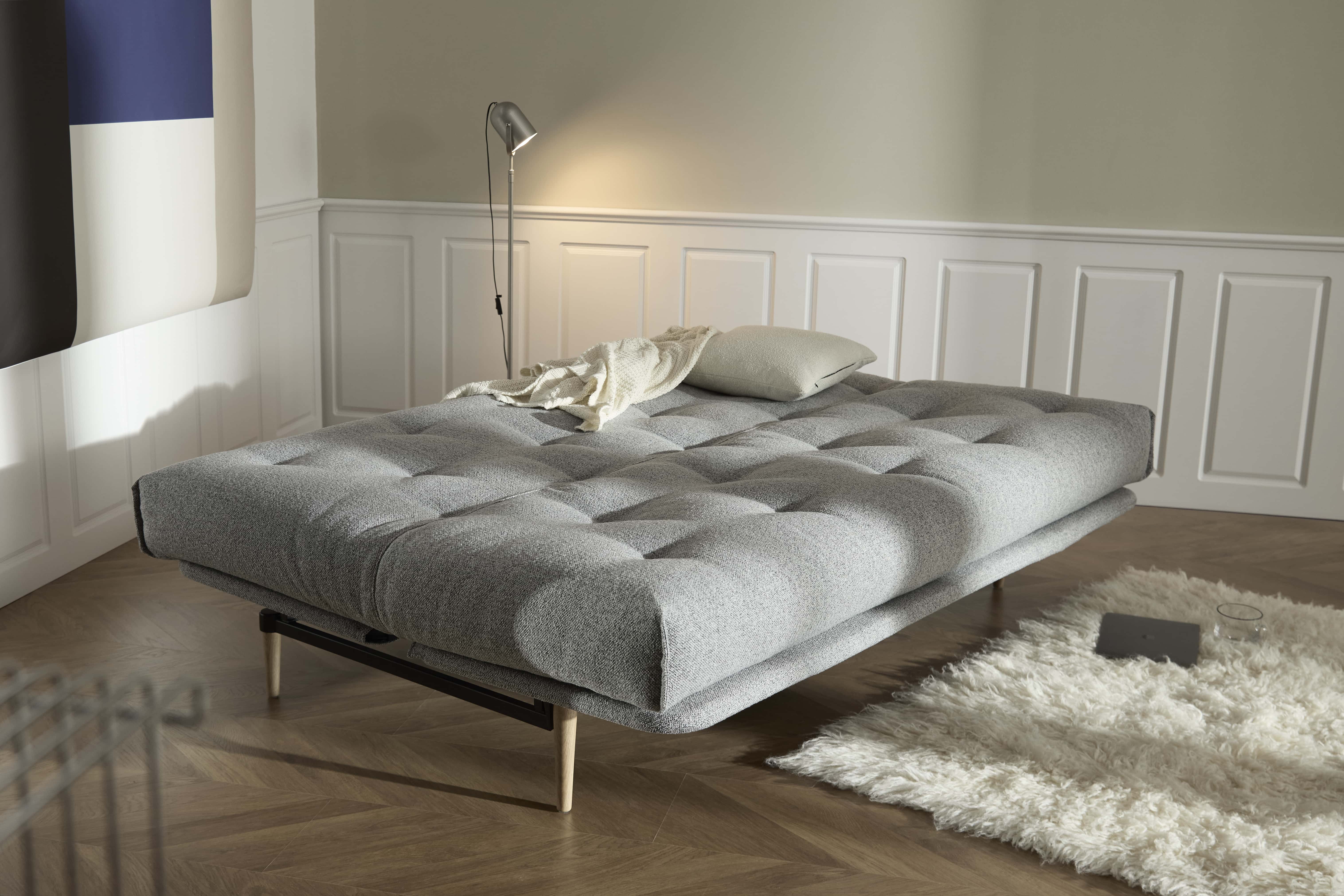 Colpus Futon Sofa Bed with lacquered oak legs, lifestyle photo